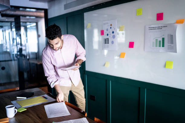 istock Businessman using digital tablet in his desk 1188390763