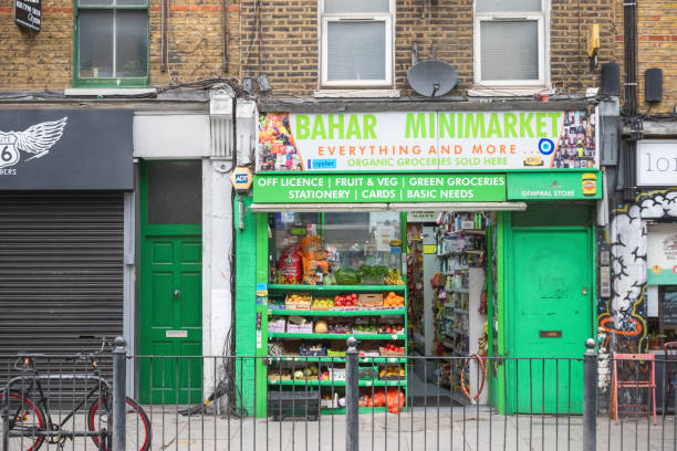 A corner shop around Hoxton in London London, UK - 12 July, 2019 - A corner shop selling a range of everyday items around Hoxton run down neighborhood stock pictures, royalty-free photos & images