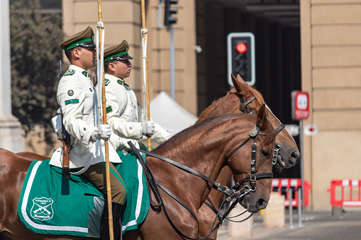 SANTIAGO, CHILE – FEBRUARY 17, 2019: Two guards performing the changing of Guards at La Moneda Palace.