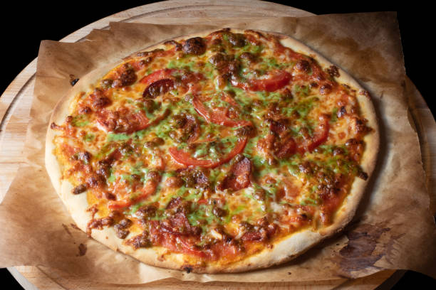 istock Top view of pizza on baking paper 1188393349