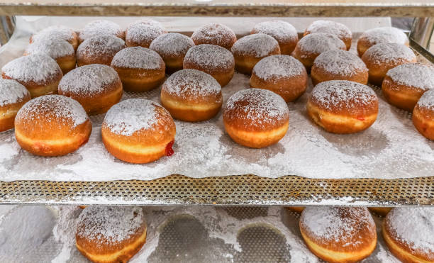 istock Sweet donuts on a public market place 1188396577