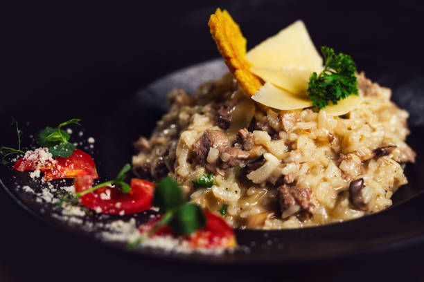 istock Rice cooked with meat, oriental risotto closeup. 1188398157