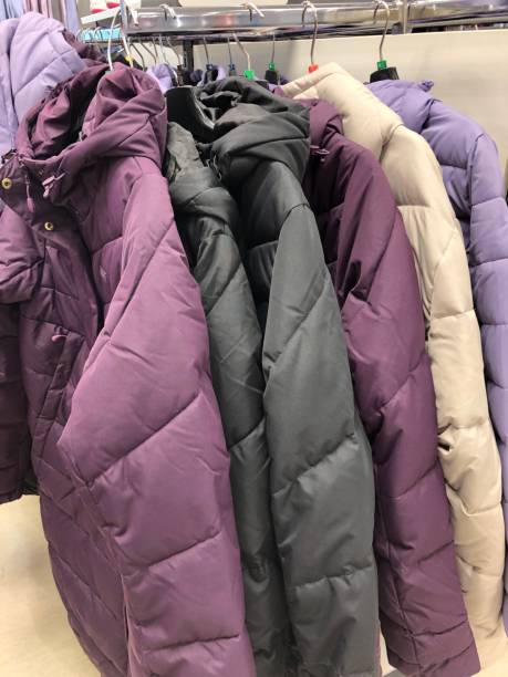 istock new clothes for winter and autumn on hangers 1188398706