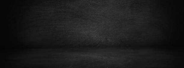 istock dark texture chalk board show room and studio with black banner background 1188400164