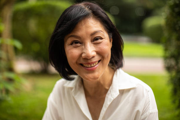 istock Attractive senior Taiwanese lady smiling 1188400391
