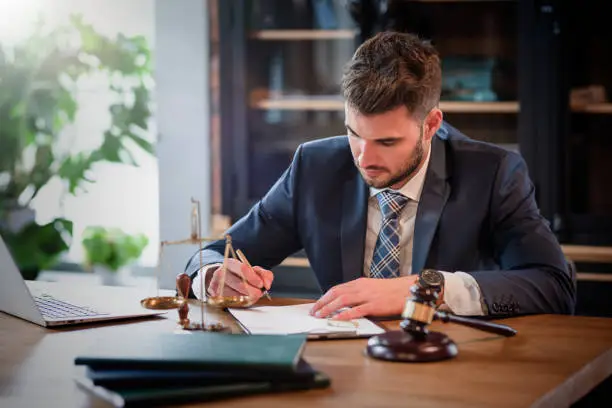 Photo of Lawyer or attorney working in the office