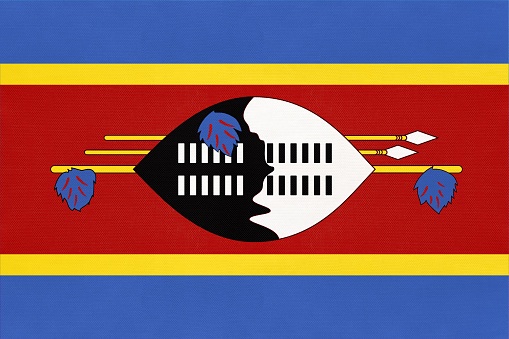 Kingdom Eswatini national fabric flag textile background. Symbol of international world African country. State Swaziland official sign.