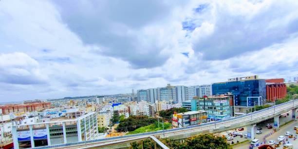 A Cloudy evening in Hitechcity, Hyderabad. Hyderabad Metro from Cyber towers to Mindspace. A beautiful scene of cloudy weather. hyderabad india stock pictures, royalty-free photos & images