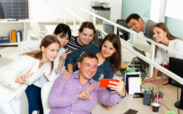istock successful interracial business team making selfie 1188405863
