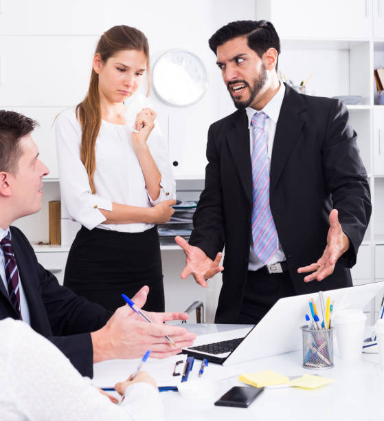 istock Outraged manager with colleagues at meeting 1188405894