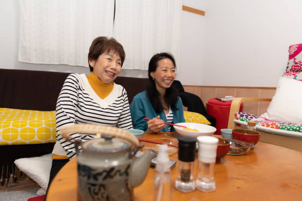 istock Mother and daughter enjoying dinner 1188406428