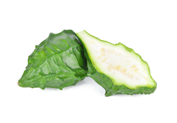 istock whole and half cut fresh dragon gourd (dragon egg) on white background 1188406496