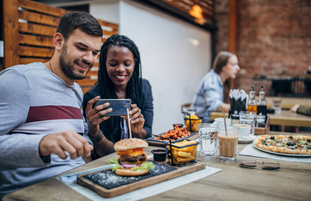 istock Young couple on lunch outdoors in pub 1188409880
