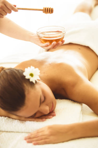 istock Woman having honey spa treatment 1188410907