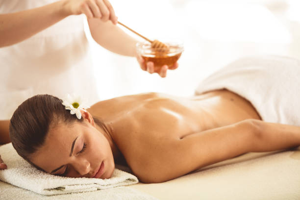 istock Woman having a honey spa  treatment 1188410908