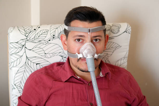 istock young white man with sleep apnea 1188411211