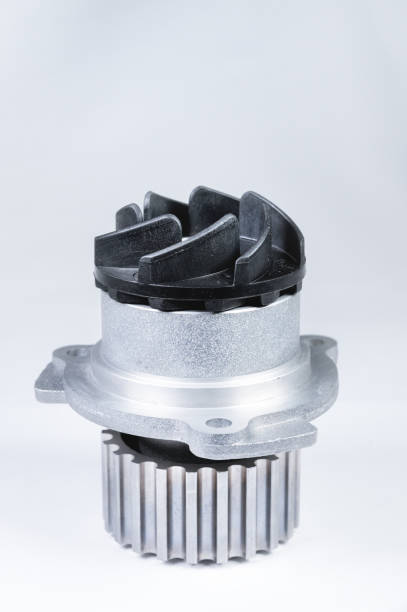 istock New metal automobile pump for cooling an engine water pump on a gray background with a gradient. 1188412836