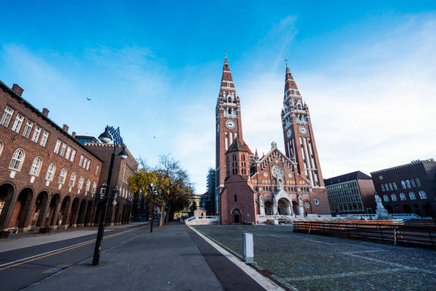 The votive church and cathedral of Our Lady of Hungary , twin spired church on Dom square in Szeged town in Hungary