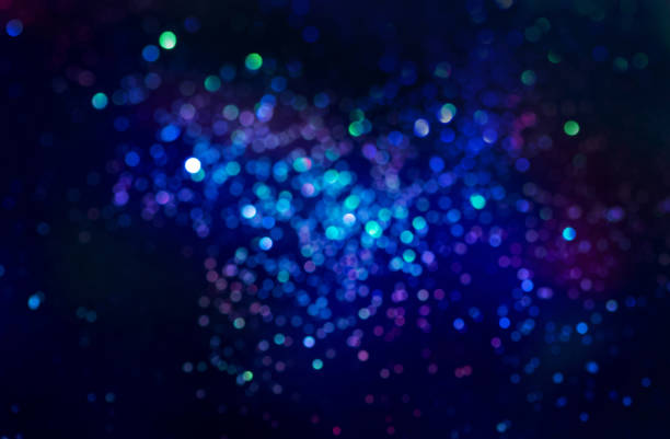 istock glitter bokeh lighting effect Colorfull Blurred abstract background for birthday, anniversary, wedding, new year eve or Christmas 1188418751