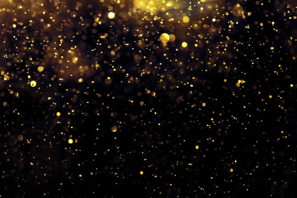 istock golden glitter bokeh lighting texture Blurred abstract background for birthday, anniversary, wedding, new year eve or Christmas 1188419106