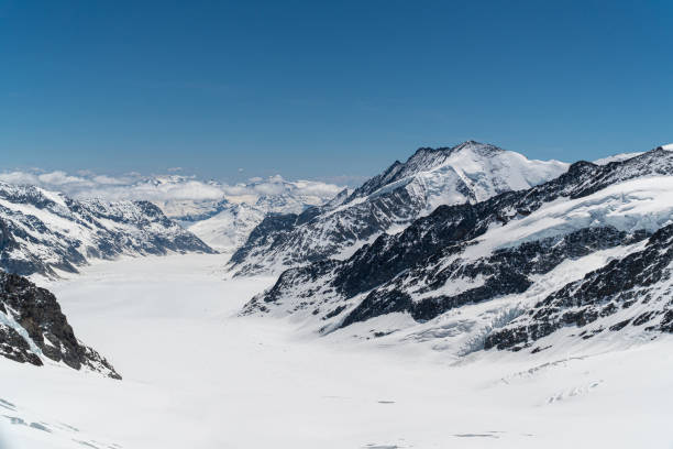 istock Panoramic view on winter snowy mountains 1188420668