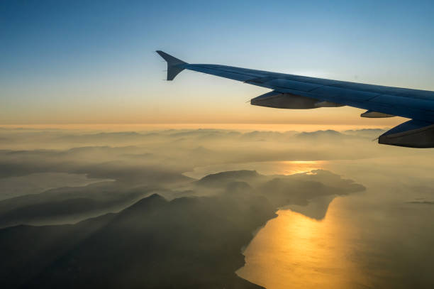 View on passenger aircraft left wing. stock photo