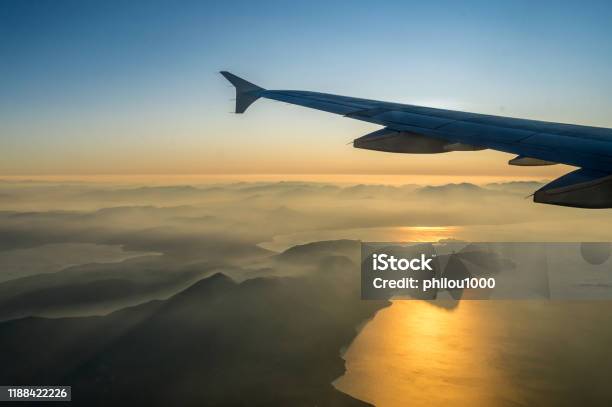 View On Passenger Aircraft Left Wing Stock Photo - Download Image Now - Airplane, Flying, Above