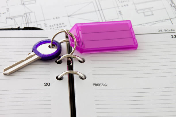 ID card on a purple lanyard