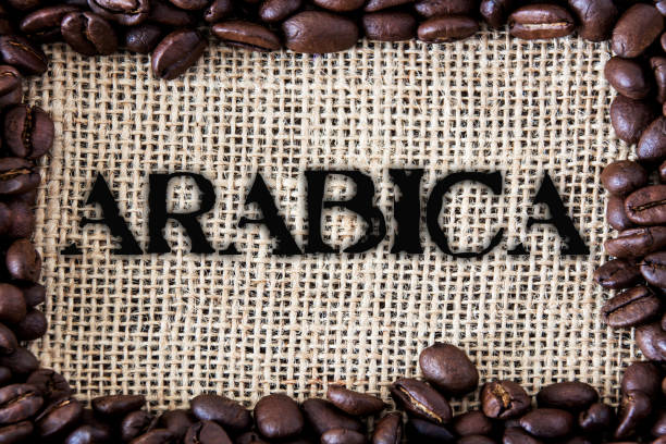 istock Coffee beans on jute background 1188422344