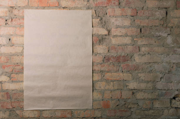istock Vertical poster for text message advertising on the vintage red brick wall.Free space for design 1188422592