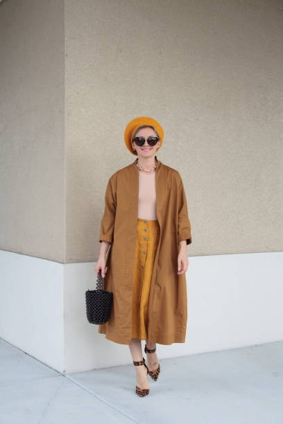 istock Woman in a trench coat 1188422866