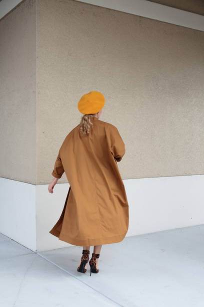 istock Woman in a trench coat 1188423719