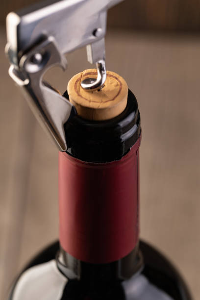 istock Corkscrew and bottle of wine 1188424746