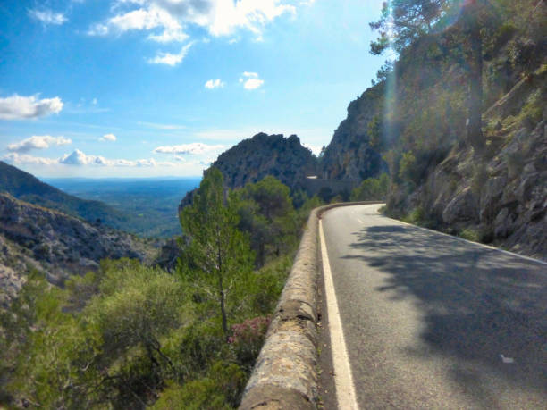 In the mountains of Majorca in Spain the road twists and turns through an arid valley