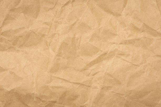 istock Crumpled brown paper texture vintage background. 1188425472