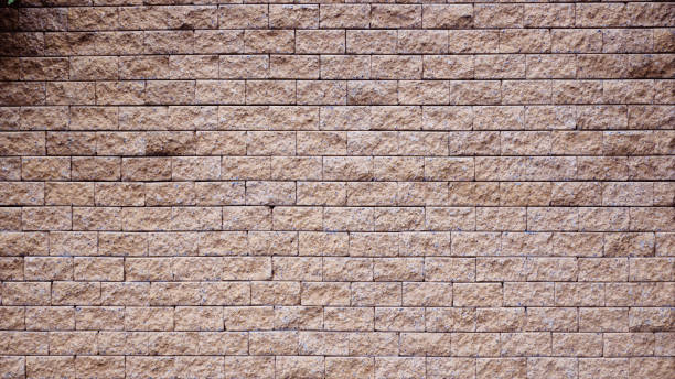 istock Brown rock stone Seamless texture, background, stone lined  walls 1188426893