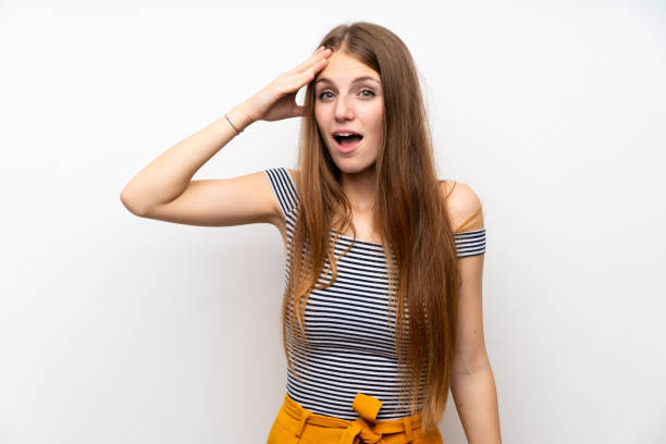 istock Young woman with long hair over isolated white wall has just realized something and has intending the solution 1188427897