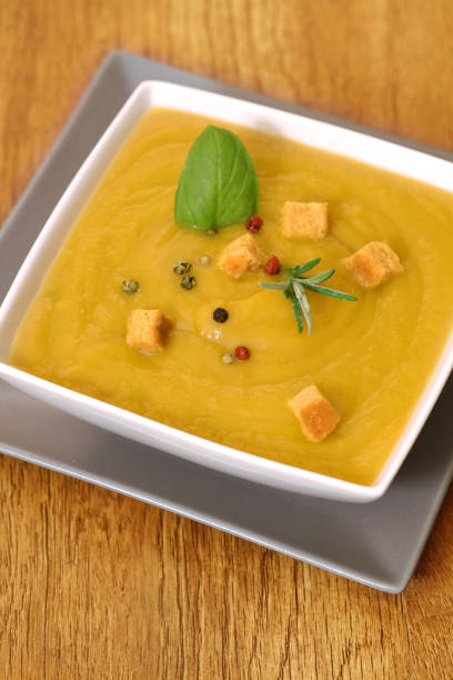 istock Vegetable soup with cream on a wooden background 1188428349