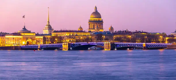 Saint Petersburg, Russia. Saint Isaac Cathedral across Neva river, St. Isaac's Cathedral on the background of sunrise.