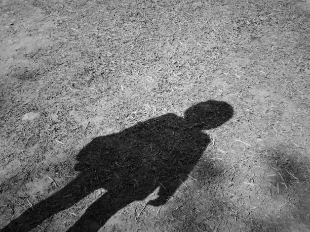 istock Women shadow on the ground,black and white tone 1188431239