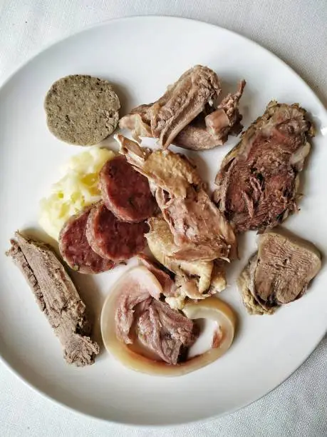 a typical italian main course: mixed meats, hen, cow, pork, boiled