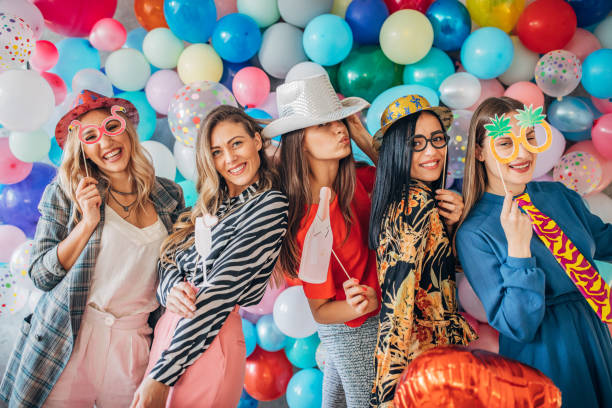 Bachelorette Group of young women having fun with balloons. Ladies night concept bachelorette party stock pictures, royalty-free photos & images