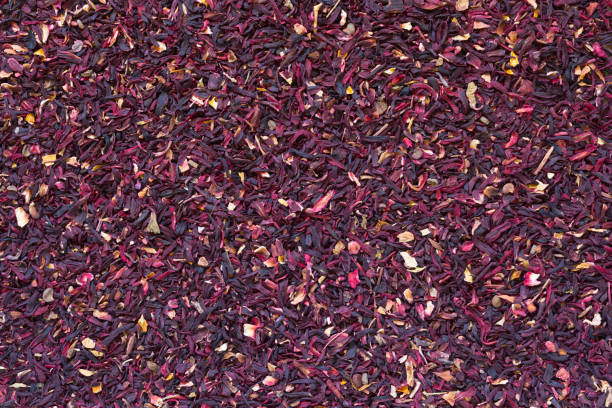 Leaves of dry cut hibiscus tea as background Leaves of dry cut hibiscus tea as the background agua volcano photos stock pictures, royalty-free photos & images