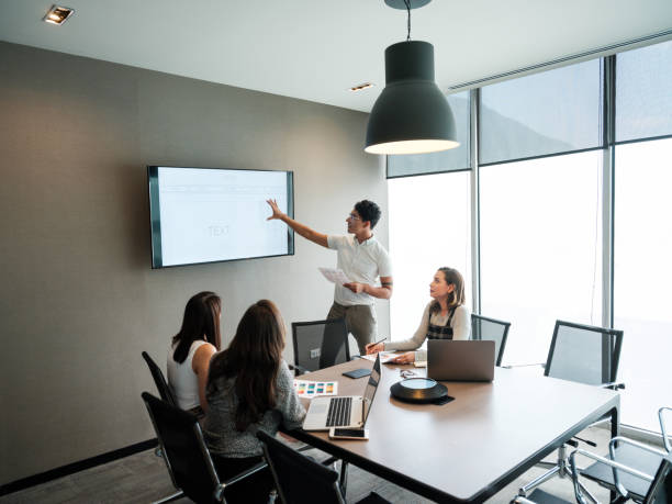 istock Young latin man showing presentation in conference room 1188440037