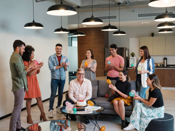 istock Latin office people clapping and celebrating coworker's birthday 1188440080