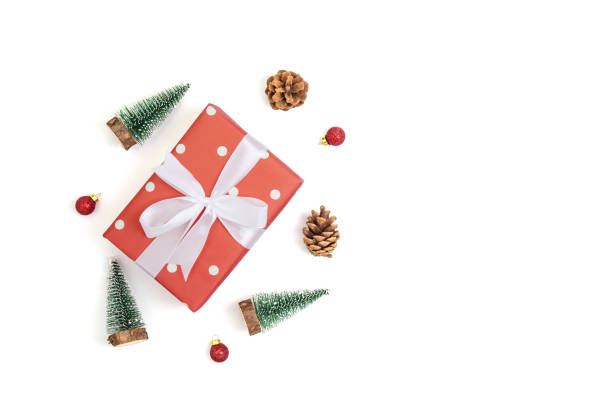 istock Christmas holiday composition with red gift box and decoration isolated on white background, new year and xmas or anniversary with presents in season, top view or flat lay. 1188441441