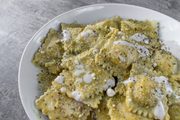 istock ravioli with pesto and cream sauce 1188441526