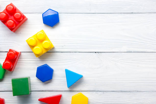 istock Kids educational developing toys frame on white background. Top view. Flat lay. Copy space for text 1188441739