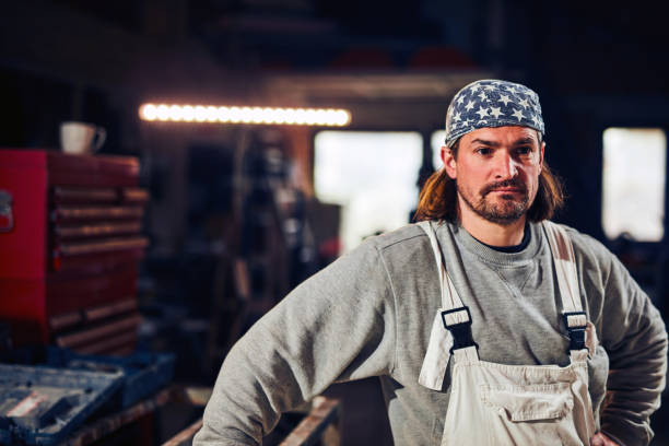 istock Handyman renovating interior, fixing and remodeling, working person with tools. 1188441830