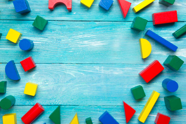 istock Kids educational developing toys frame on white background. Top view. Flat lay. Copy space for text 1188442543
